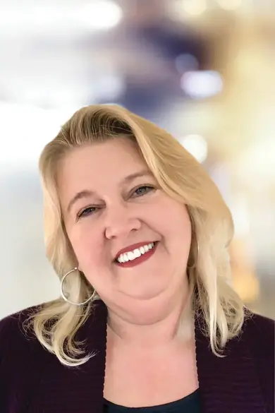 Portrait of Toni Schrock, REALTOR®.